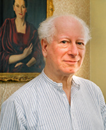A man standing in front of a painting.